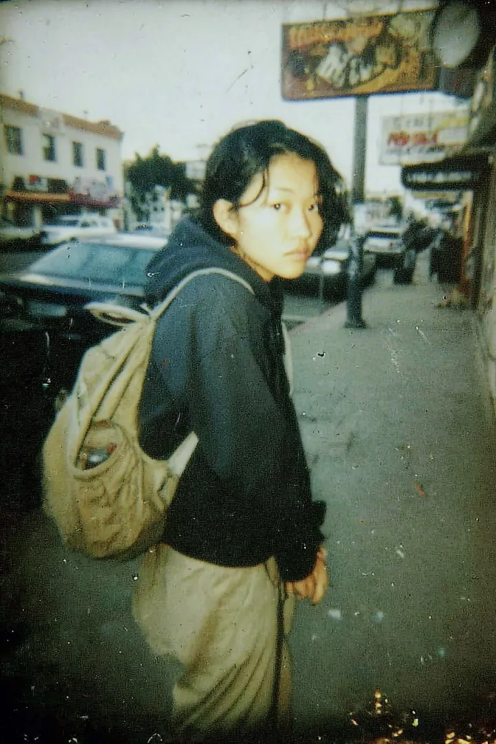 1990s Seoul teenager on the street, vintage photo 