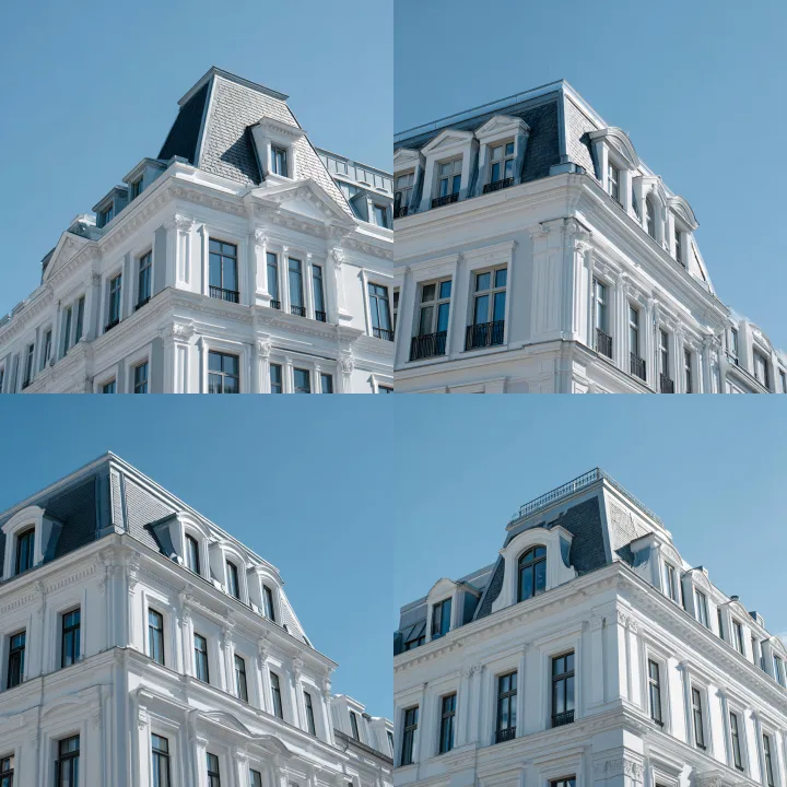 portrait of the top of a new white building with a